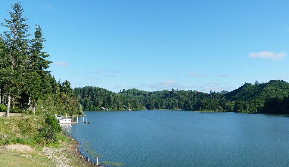 South Tenmile Lake at Lakeside — blue water against the coastal forest